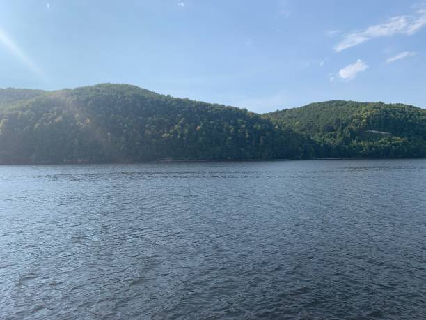 istock Green hills on the river 1280711747