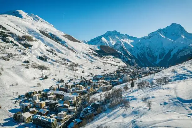 Les deux alpes resort in winter, French alps, Rhone Alpes in France Europe aerial drone photo
