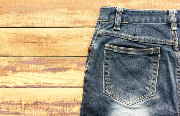 istock jeans background, texture denim empty on wood floor for wallpaper and design 1280714535