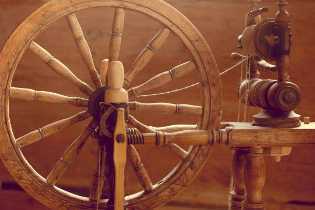 istock Oldfashioned wooden distaff, spindle, spinning wheel 1280716593