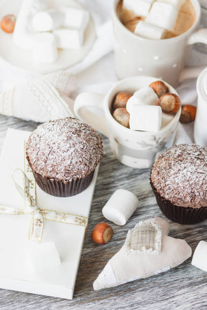 istock Cups with cacao and marshmallow, cupcakes and different decorations 1280717033