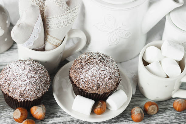 istock Chocolate cupcakes, marshmallow and different Christmas decorations 1280717684