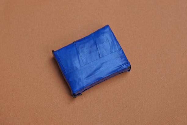 istock one small box in blue duct tape 1280717938