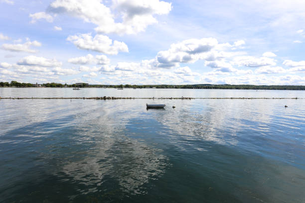 Small rowboat on the calm water of Canandaigua lake
