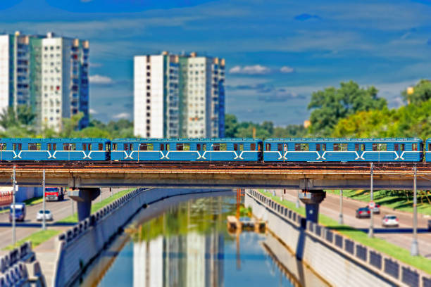 Moscow subway train on the bridge across the Yauza River with tilt shift lens effect