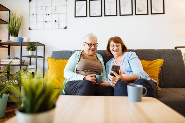 istock Senior women at home using smart phone. Seniors and technologies - 1280725620