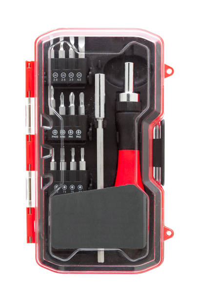 istock a set of working tools with a screwdriver and bits for repair in an label transparent plastic box with iron nozzles, an object isolated on a white background front view. 1280736769