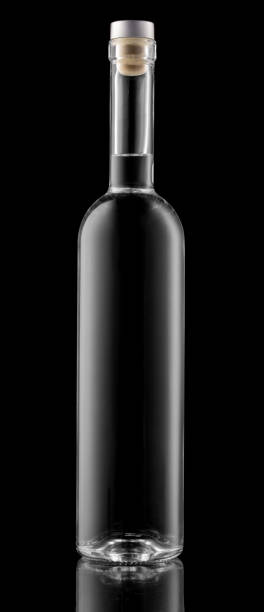 istock Bottle of vodka or gin isolated on black background, clipping path included. 1280736807