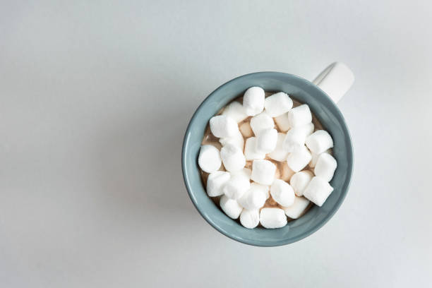 istock Cup of coffee with marshmallows, top copy space 1280738467