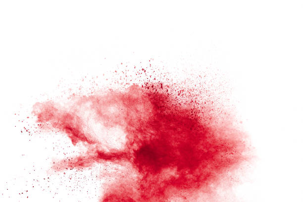 Red powder explosion on white background. Freeze motion of red dust particles splash. Red powder explosion on white background. Freeze motion of red dust particles splash. red white stock pictures, royalty-free photos & images