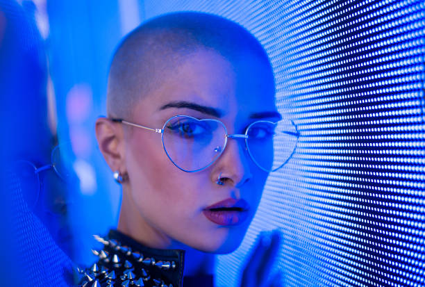 istock Beautiful woman illuminated by led lights 1280748032