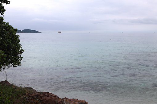 Namsai beach, the beautiful clear sea in the raining day from Thailand.