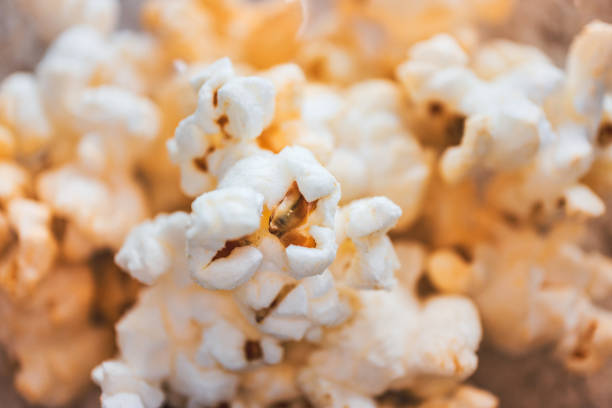 istock Popcorn with close-up macro shot in warming tone color 1280753610