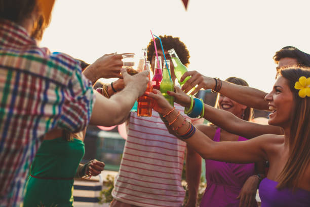 istock Celebrating longlasting friendship during summer rooftop party 1280759161
