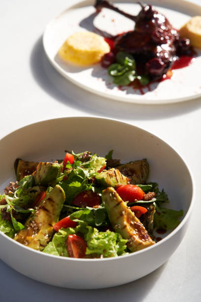 istock Avocado salad with fresh leaves and vegetable 1280759614
