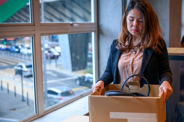 istock Dismissed worker leaving office job after termination 1280759808