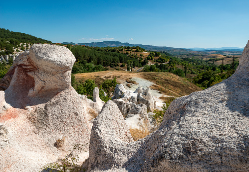 View at Rhodope mountain from rock formation named the Stone Wedding aka Petrified Wedding. Natural phenomenon near Zimzelen village, Kardjali region, Bulgaria, Europe.