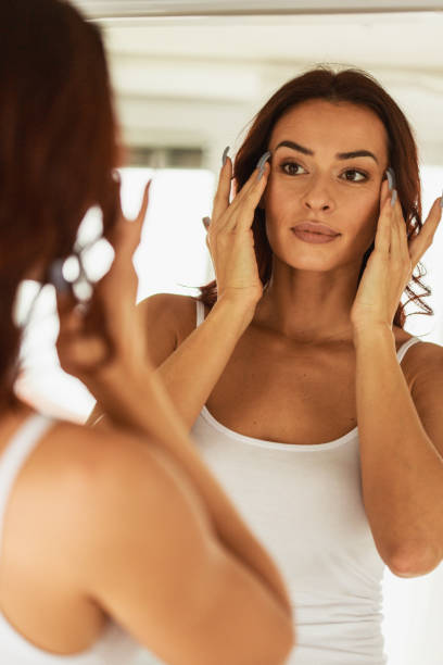 istock Woman checking her eye line expressions 1280767029