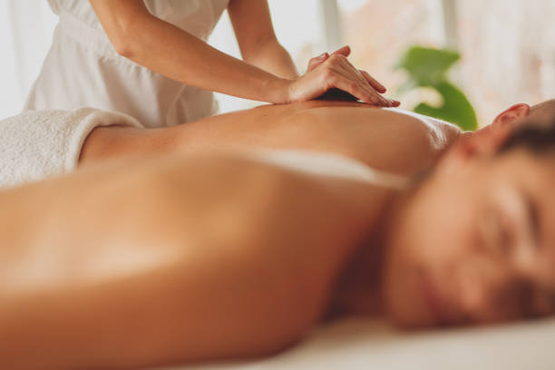 istock Unrecognizable massage therapist massaging male client's back 1280770250
