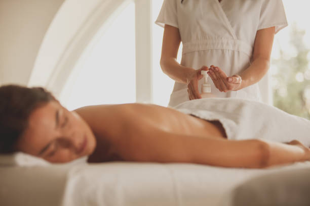 istock Woman about to receive back massage 1280770258