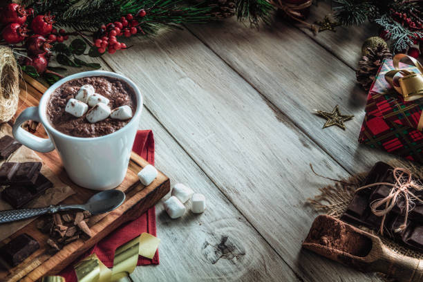istock Christmas table setup with homemade chocolate mug with marshmallows with copy space on white rustic table 1280771044