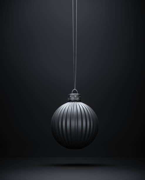 istock Vertical striped Christmas ornament against dark background. 1280771251