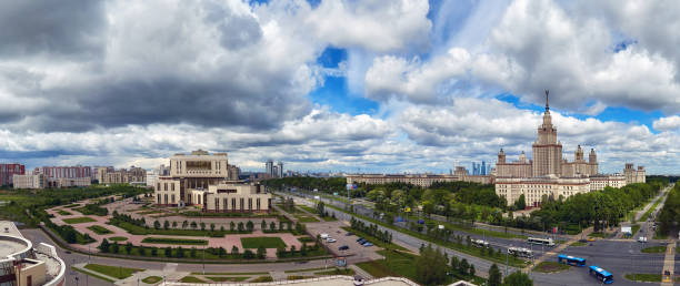 istock Wide angle panoramic view of Moscow university campus under dramatic sky with stormy clouds 1280772277