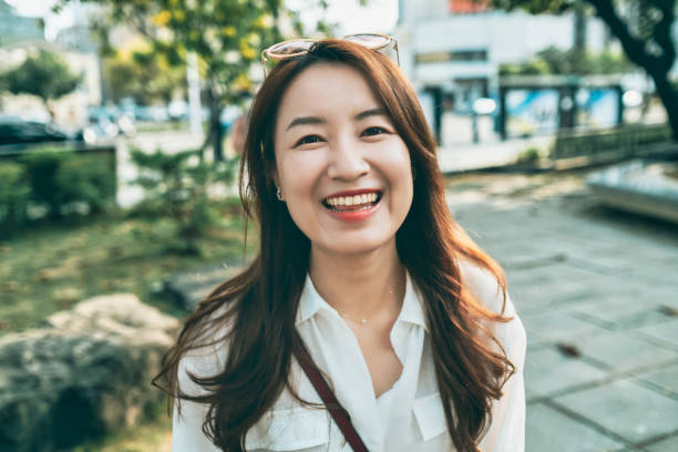 Asian Woman Smile To Camera