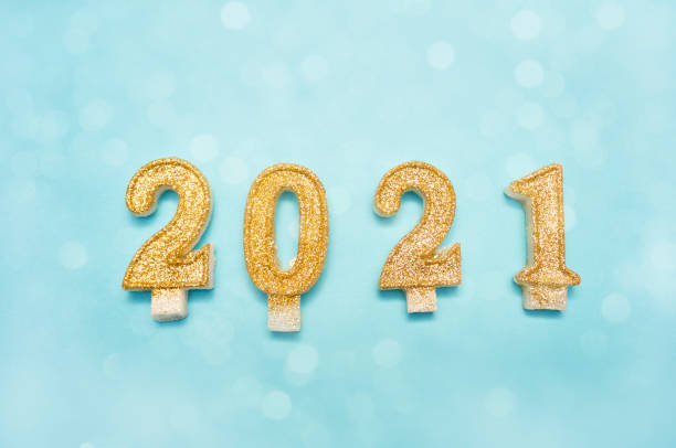 istock Happy new year 2021 celebration, glitter numbers on blue background 1280779082