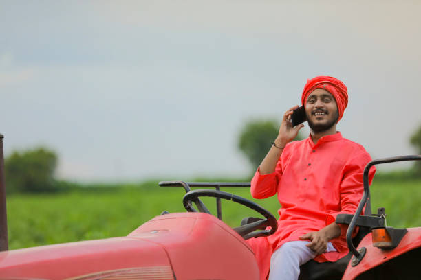istock young indian farmer talking on smartphone 1280782362