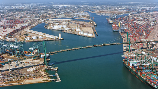 Aerial view of the Vincent Thomas Bridge across the Los Angeles Harbor, connecting San Pedro and Terminal Island in California, USA.