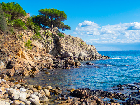 Caló des Moro ('small bay'), also Cala de Sa Comuna, is a bay in the southeast of the Spanish Balearic island of Mallorca. It is located on the coast of the municipality of Santanyí, southwest of the village of Cala Llombards, towards Cap de Ses Salines, the South Cape Mallorcas.