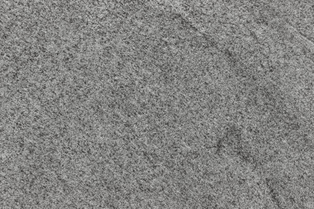 istock The texture of a natural stone slab from granite. 1280784940