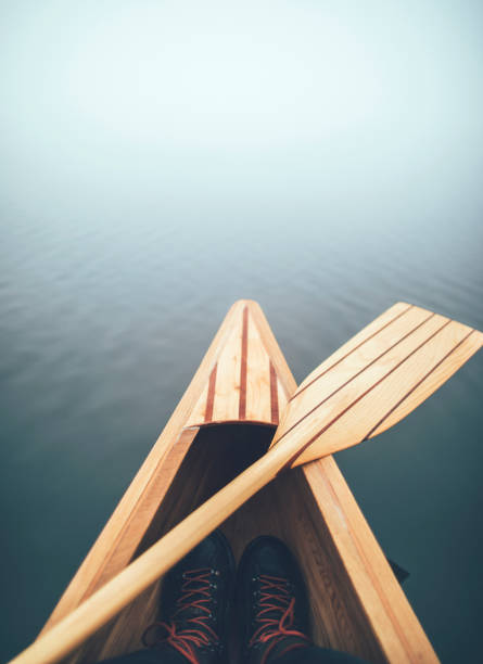 istock Canoe bow and paddle in the haze 1280787475