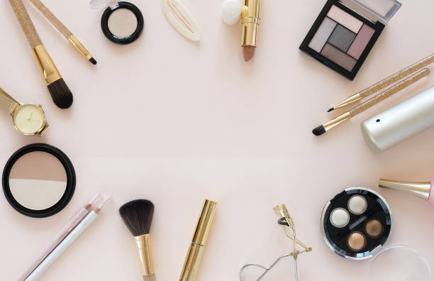 istock Makeup professional decorative cosmetics frame on beige background top view.Copy space 1280788927