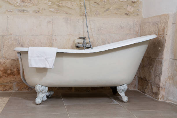 istock Antique bathtub with feet 1280791310