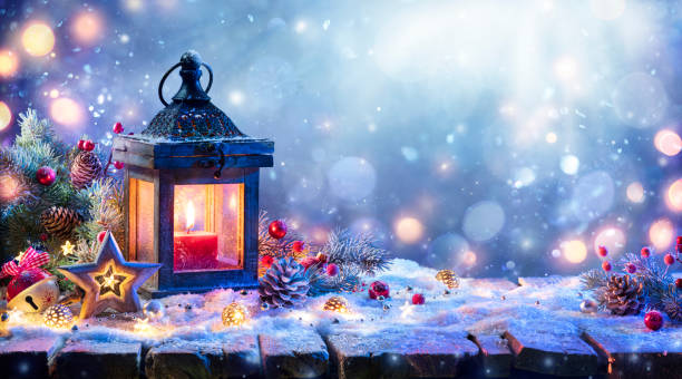 istock Christmas Lantern With Fir Branch On Snowy Table At Evening 1280792033
