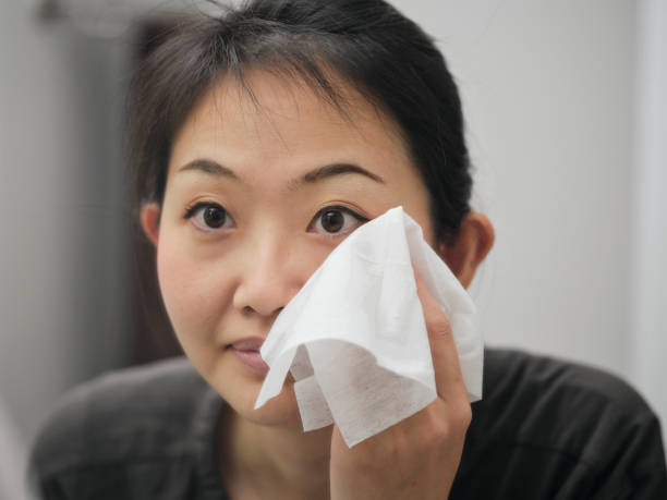 istock Japanese Woman Removing Her Makeup 1280792395