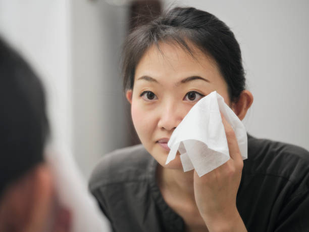istock Japanese Woman Removing Her Makeup 1280792401