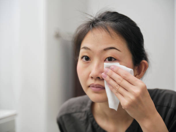 istock Japanese Woman Removing Her Makeup 1280792453