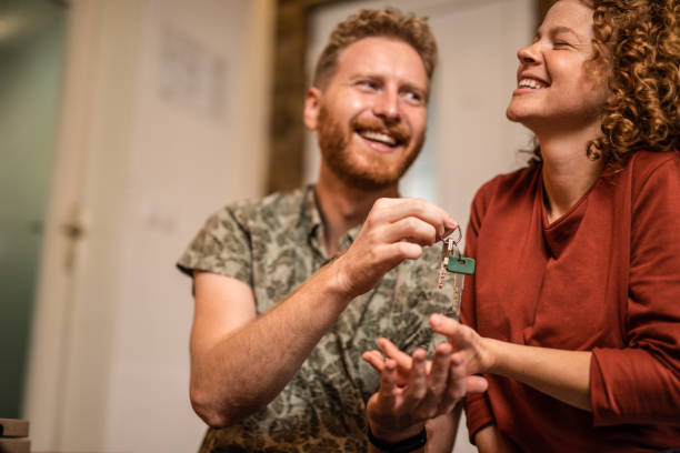 istock Happy young couple bought their new home. 1280800801