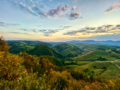 Sunny summer evening view across a range of Apuseni Mountains in Romania, in the county of Alba
