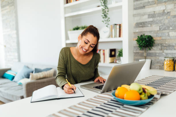 istock Beautiful young Caucasian woman working from home 1280807079