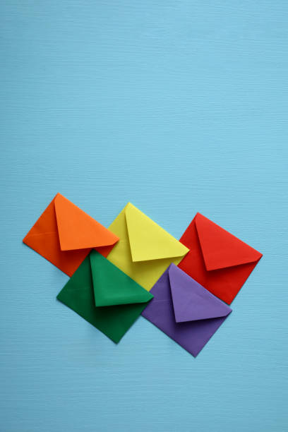 istock Close-up of color envelopes on blue background 1280807215