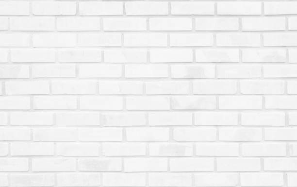 istock White brick wall texture background in room at subway. Brickwork stonework interior, rock old concrete grid uneven abstract weathered grey clean tile design, horizontal architecture wallpaper. 1280811332
