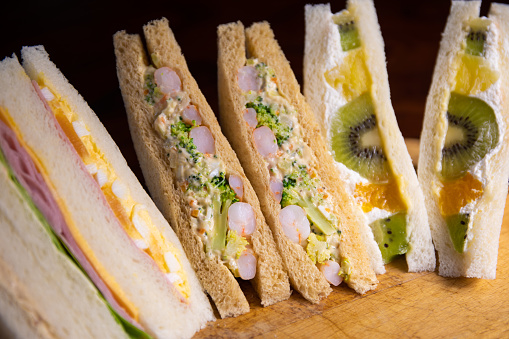 Various types of sandwiches that are available all over Japan in their convenience stores. Some on display here include Ebi (prawn) and Broccoli, Ham cheese and lettuce, Tuna and a desert sandwich with various kinds of fruit and cream.