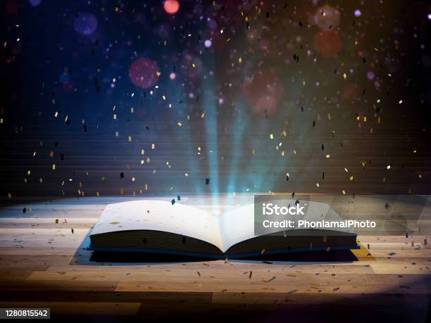 Book Opened With Flare Light And Confetti Stock Photo - Download Image Now - Book, Confetti, Magician
