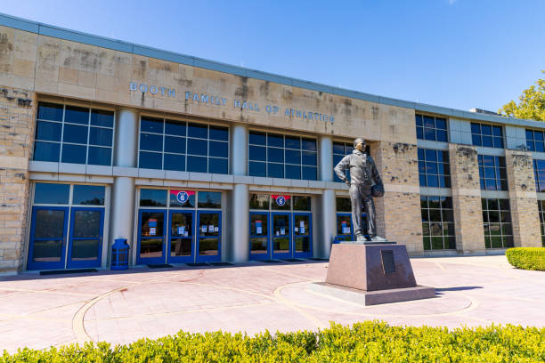 Booth Family Hall of Athletics, at the Allen Field House, on the campus of The University of Kansas, with statue of Forrest "Phog" Clare Allen in front. Lawrence, Kansas, USA - October 1, 2020: Booth Family Hall of Athletics, at the Allen Field House, on the campus of The University of Kansas, with statue of Forrest "Phog" Clare Allen in front. kansas basketball stock pictures, royalty-free photos & images