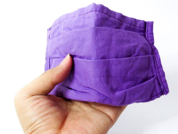 istock purple mask on white background 1280822992