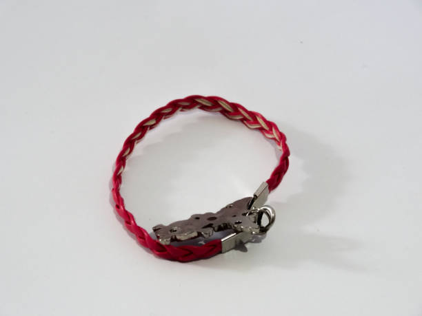 istock bracelet in pink on white background 1280828047